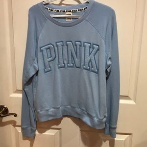 A soft baby blue sweater from Pink.